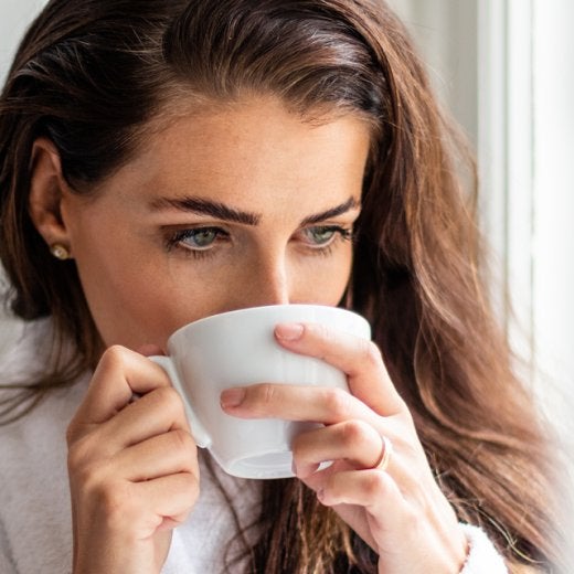 Women having a sip of coffee