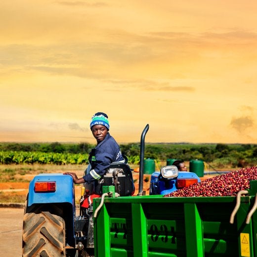 woman driving traktor